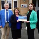 IKM Gold Investors in People award, left to right: Ian MacLachlan, chairman; Michelle Thomson MSP; Liz Copland, environmental director, and David Taylor, MD . Pic: Michael Gillen
