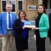 IKM Gold Investors in People award, left to right: Ian MacLachlan, chairman; Michelle Thomson MSP; Liz Copland, environmental director, and David Taylor, MD . Pic: Michael Gillen
