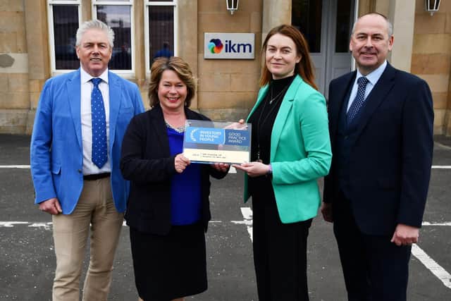 IKM Gold Investors in People award, left to right: Ian MacLachlan, chairman; Michelle Thomson MSP; Liz Copland, environmental director, and David Taylor, MD . Pic: Michael Gillen