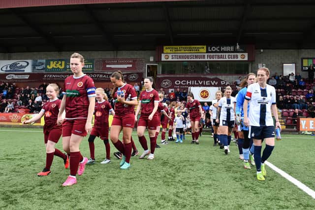 Both teams enter the Ochilview pitch in front of a large crowd for the SWF League One encounter (Photo: Michael Gillen)