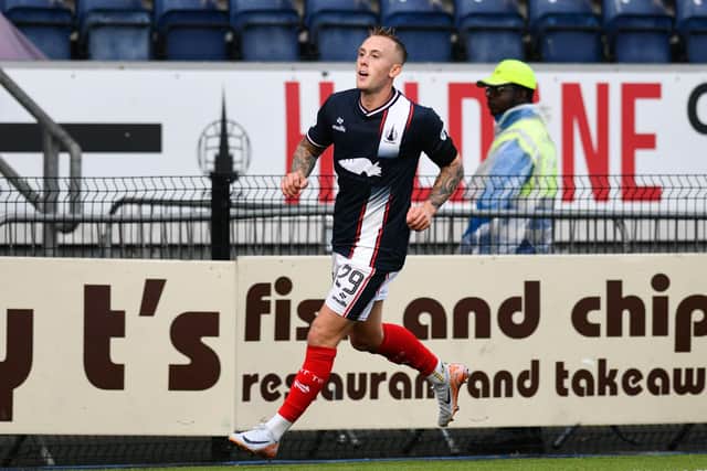 Calvin Miller wheels away after scoring for Falkirk against Queen's Park (Photo: Michael Gillen)