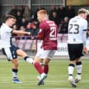 Falkirk midfielder Dylan Tait's shot comes off Ethan Ross during last Saturday's 1-0 win at Kelty Hearts (Photo: Michael Gillen)