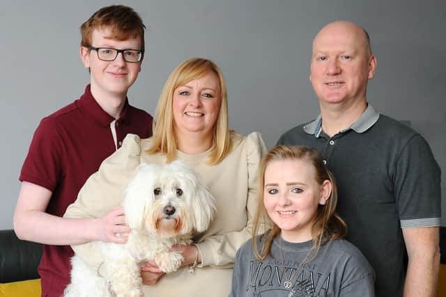 Brightons teenager Ashlee Easton enjoyed a postponed Christmas with brother Jayden (16), dog Angel, mum Lisa and dad Donald. Picture: Michael Gillen.