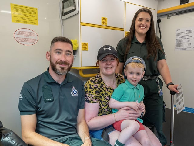 A family photo with the Scottish Ambulance Service.