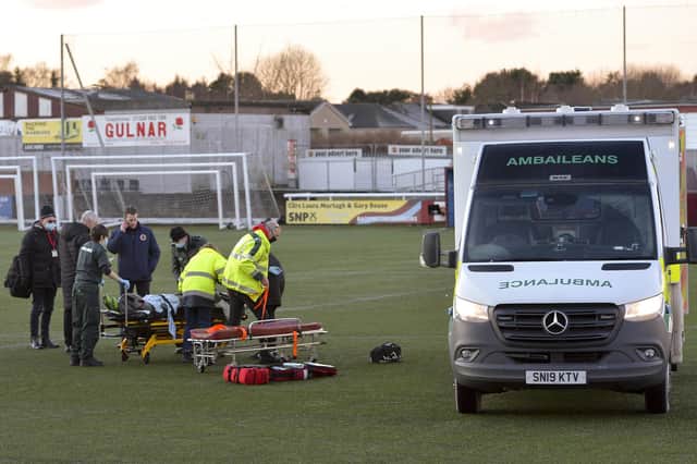Adam McCracken is taken to hospital as a precaution following his injury in Stenhousemuir's match with Stiring Albion