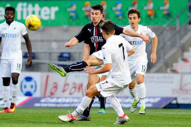 James challenges Connor Langton, now of Camelon Juniors.