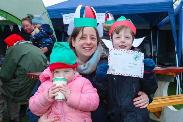 Megan Hammond with her children Elspeth, 3, and Robert, 5, from Falkirk getting ready to send their letters to Santa