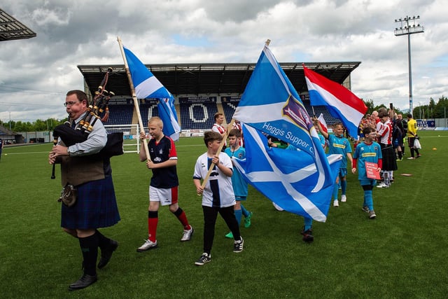 A piper helped lead the teams out before the tournament kicked off with a opening ceremony