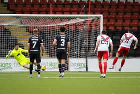 Debutant Brian Kinnear saved ex-Falkirk midfielder Charlie Telfer's spot kick to keep the score at 1-1 (Pics by Alan Murray)