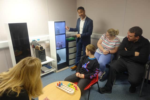 Jenni Minto, Minister of Public Health and Women’s Health, met 10-year-old Adam Tasker, from Falkirk, and his parents while visiting the service in Stirling.  (Pic: NHS Forth Valley)