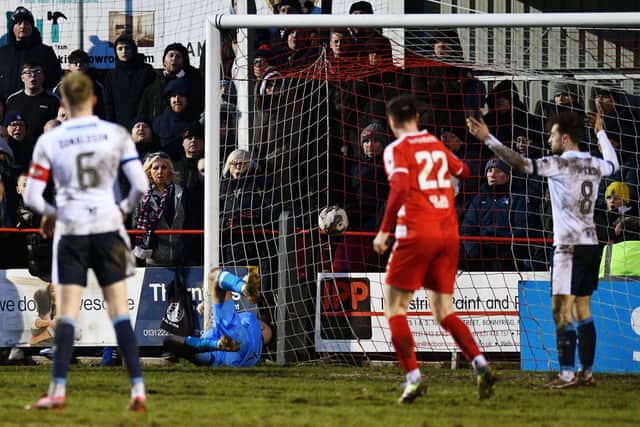 Donaldson can only watch on as Bradley Barrett's flick on from Angus Mailer's header flies past Sam Long into the back of the net to make it 2-1 in injury-time (Photo: Michael Gillen)