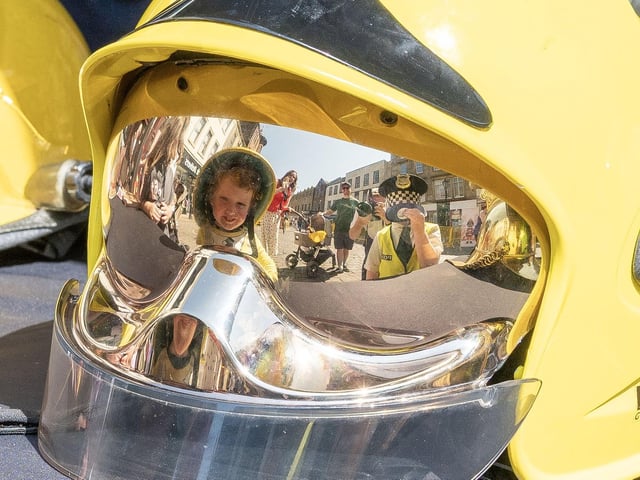 Reflecting in the visor.