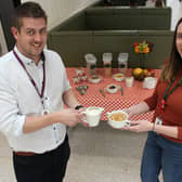 Gareth Davies, chef manager for Forth Valley College and Lynne Tomlinson, communications and marketing coordinator for Forth Valley Student Association preview the free breakfast table