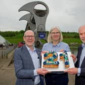 Transport Minister Kevin Stewart; Maureen Campbell, Scottish Canals chair and Richard Millar, Scottish Canals interim CEO, mark the 21st birthday of The Falkirk Wheel.  Pic: Peter Sandground.