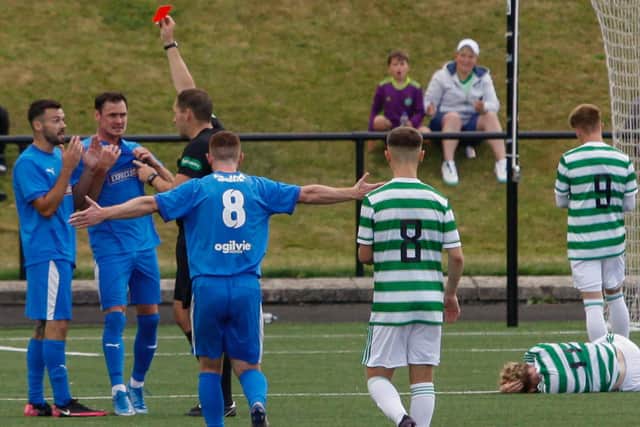 Nicky Locke looks stunned to receive his marching orders against Celtic B (Pic by Michael Gillen)