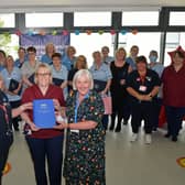 Book of pandemic reflection handed over by Hilary Nelson, nurse and RCN Forth Valley branch representative, left, to Cathie Cowan, Forth Valley NHS chief executive, and Professor Frances Dodd, executive nurse director. Pic: Michael Gillen