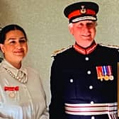 Ghulam Farid's family receive his British Empire Medal from Lord Lieutenant of Stirling and Falkirk Alan Simpson