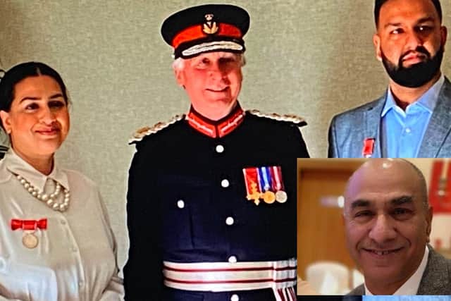 Ghulam Farid's family receive his British Empire Medal from Lord Lieutenant of Stirling and Falkirk Alan Simpson