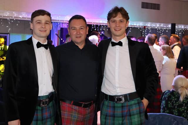 Linda's husband Colin Myles with sons Ross and Andrew who all helped with the fundraising. Pic: Contributed