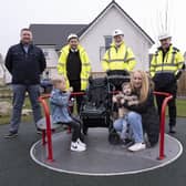 The new play equipment at Kinnaird Lee play park. Left to right: Diarmuid McNamara of Kompan Scotland, David McKie of Cala Homes (West), Billy Campbell of Cala Homes (West) and Gerry Rea of Allma with Cameron, his mum Susan and friend Jake