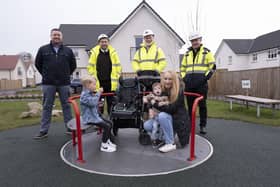 The new play equipment at Kinnaird Lee play park. Left to right: Diarmuid McNamara of Kompan Scotland, David McKie of Cala Homes (West), Billy Campbell of Cala Homes (West) and Gerry Rea of Allma with Cameron, his mum Susan and friend Jake