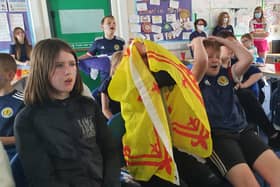 Pupils in P6B at Denny Primary watch the big game (Pic: Michael Gillen)