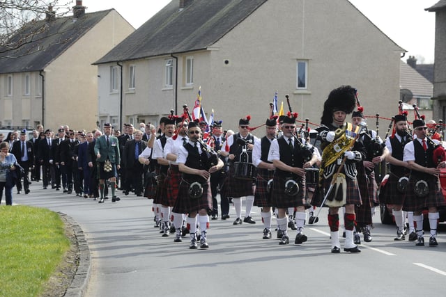 Glencorse Pipe Band led the parade from Gairdoch Park to the new war memorial site at Fernlea