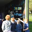 Chris Laidlaw with youngsters at Bo'ness Rugby Club Crash Den opening