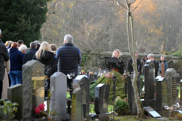 The burial of life-long Falkirk FC fan and Free Collier Ian Irvine took place at Polmont Cemetery. Picture: Michael Gillen.