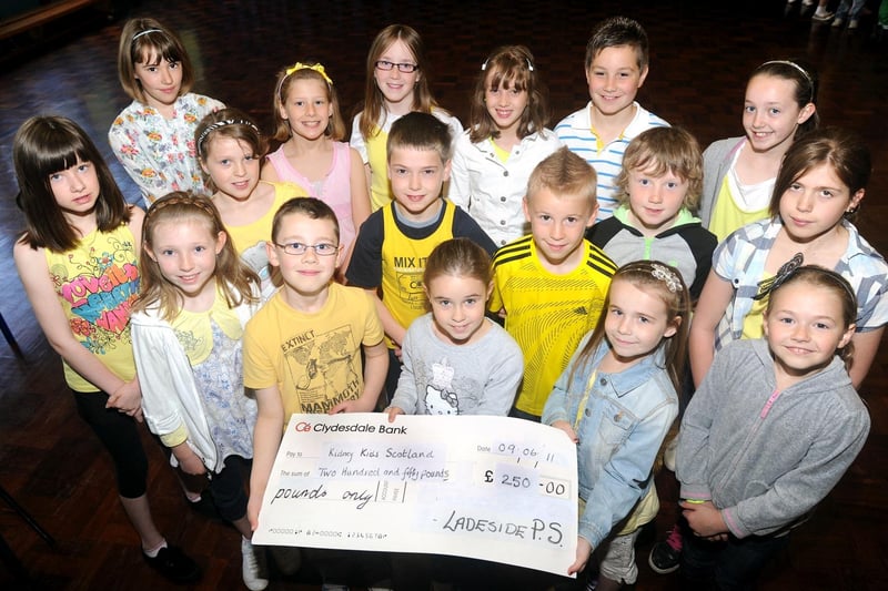Ladeside Primary pupil council with the money they raised for Kids4Kids with their Easter show back in 2011