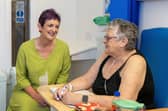 Angela Constance, Cabinet Secretary for Health and Care, spoke with patient Marion Bell, from Stenhousemuir, in the Acute Frailty Unit at Forth Valley Royal Hospital on Monday.  (Pic: Michael Gillen)