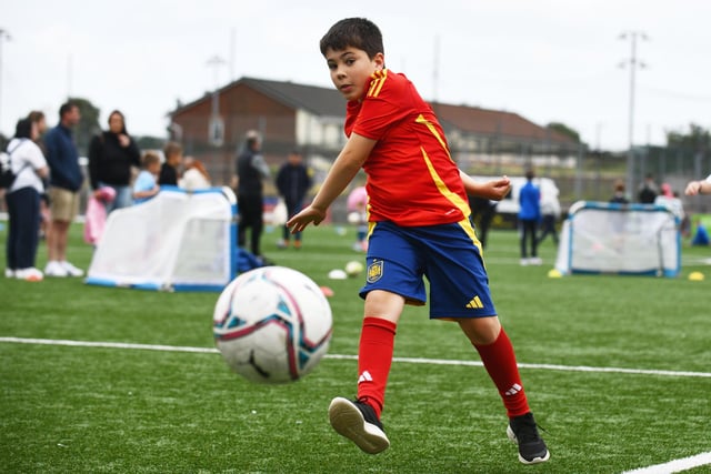 This youngster sporting a Spain strip showed his shooting skills on the Ochilview Park pitch