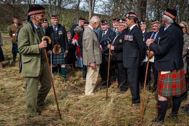 HM The King meets Argyll and Sutherland Highlander veterans ahead of the tree planting.