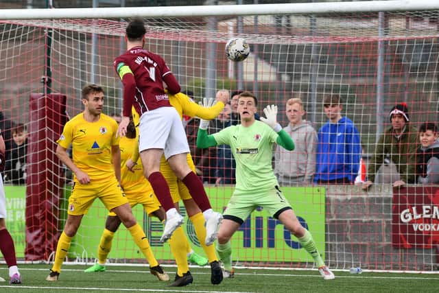 Stenhousemuir captain Gregor Buchanan rises highest in the box from a corner kick to head home past Bonnyrigg Rose goalkeeper Paddy Martin (Photo: Michael Gillen)