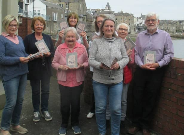 Members of Queensferry History Group, pictured with the booklet.