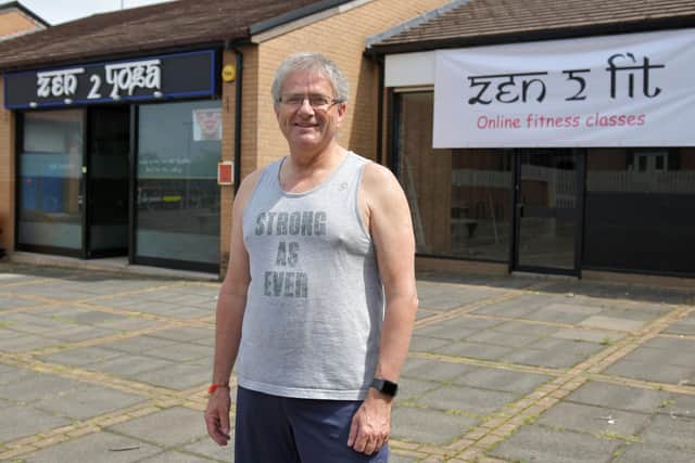 Zen 2 Yoga director Chris Dickson outside the company's two premises in Polmont