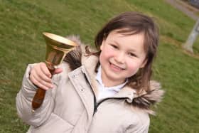 Mila Sneddon, 6, rings the bell as she is in remission from acute lymphoblastic leukaemia