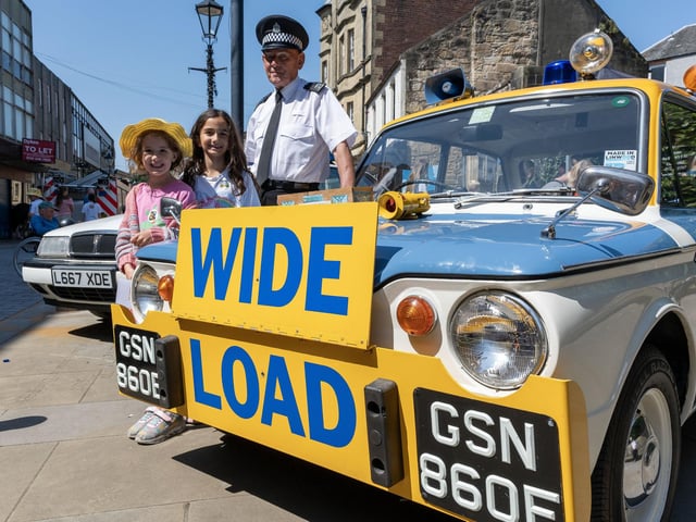 A vintage police vehicle display.