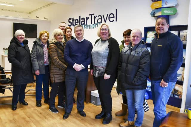 John Barr and Kay Sommerville with customers celebrating five years in business for Stelar Travel. Pic: Michael Gillen