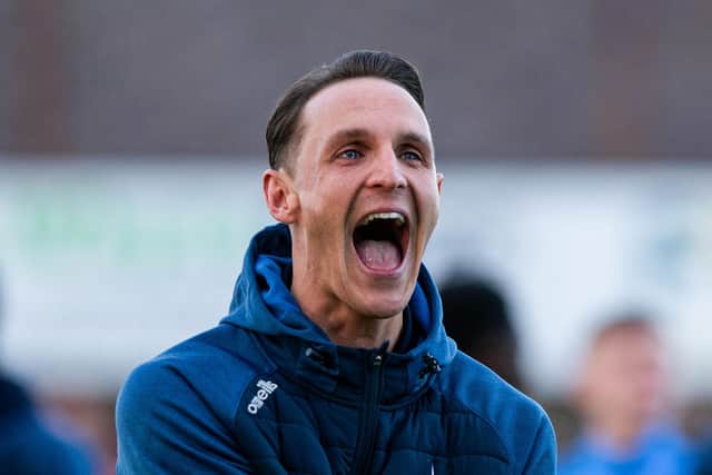MONTROSE, SCOTLAND - MARCH 30: Falkirk's Liam Henderson celebrates after being Falkirk are crowned League 1 champions during a cinch League One match between Montrose and Falkirk at Links Park Stadium, on March 30, 2024, in Montrose, Scotland.  (Photo by Sammy Turner / SNS Group)