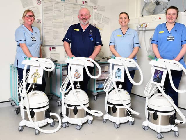 The Fracture Clinic team welcomed some new Cast Saws named after Star Wars characters. Pictured: Nicole Hastie, clinical support worker with C-3PO; Kevin McCloskey, senior charge nurse with BB-8; Arlene Pentecost, clinical support worker with R2-D2 and Heather Morrison, staff nurse with WALL-E. Pic: Michael Gillen