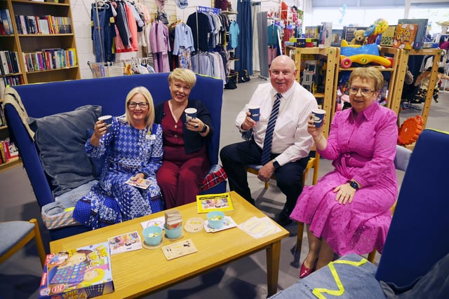 Deputy Area Manager Fiona Hannah, Mhairi McAinsh, Area Manager David Rennie and CEO Irene McKie enjoy a drink in the new 'public living room' area.