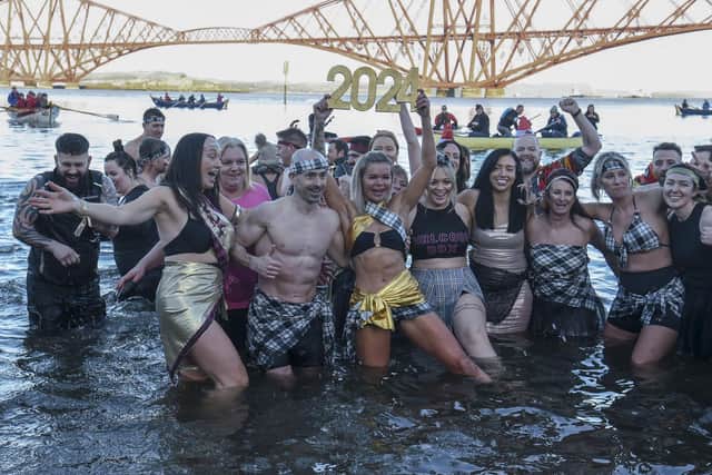 Members of Grangemouth gym Girlcode Box were among the revellers taking part in the Loony Dook at South Queensferry on January 1, 2024.  (Pic: Lisa Ferguson)