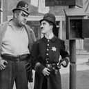 Easy Street (1917), starring Charlie Chaplin.