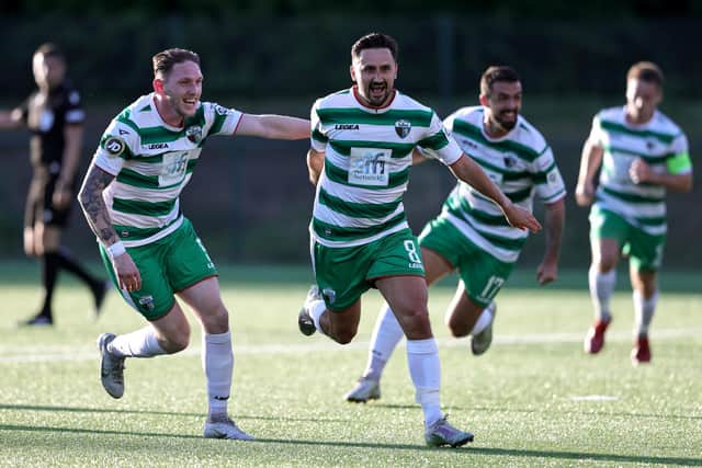 Ryan Brobbell and Declan McManus of The New Saints celebrates scoring their team's first goal during the UEFA Champions League First Qualifying Round First Leg match between The New Saints (TNS) and Linfield at Park Hall Stadium on July 05, 2022 in Oswestry, England. (Photo by David Rogers/Getty Images)