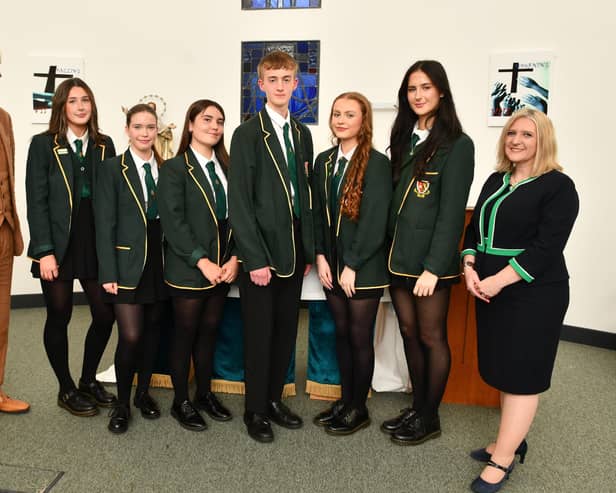 David Cameron, guest speaker; Eve Donaldson, Junior Proxime accessit; Maya Graham, Junior Proxime accessit; Ella Hawthorne, Junior Dux; Tom Shearer, Junior dux; Hollie McGuire, Senior dux; Aisling Stassin, Senior Proxime accessit and Dr Patricia Holland, Headteacher.  (Pic: Michael Gillen)