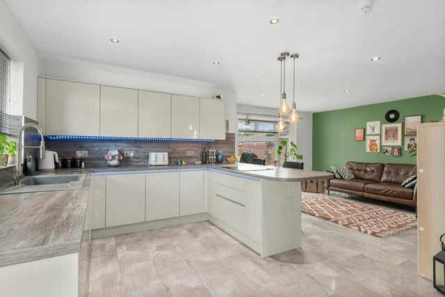 An impressive open plan kitchen/living area is undoubtedly the heart of this lovely home.