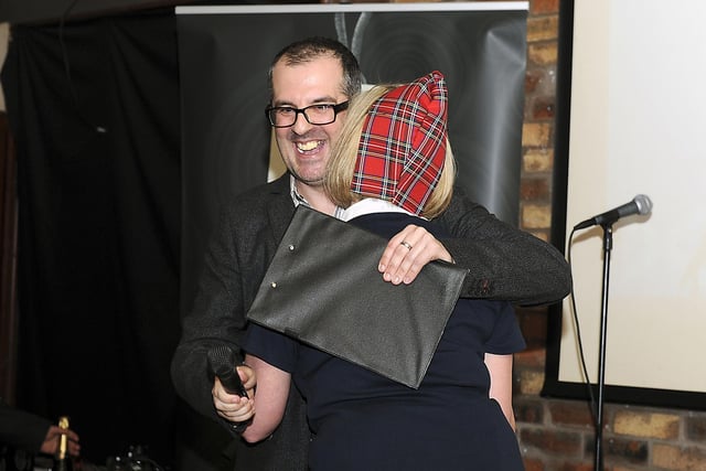 A hug for Ewen Cameron.