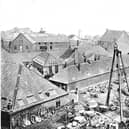 The Carron Iron Works 'triangle' with its bell on top.