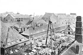 The Carron Iron Works 'triangle' with its bell on top.